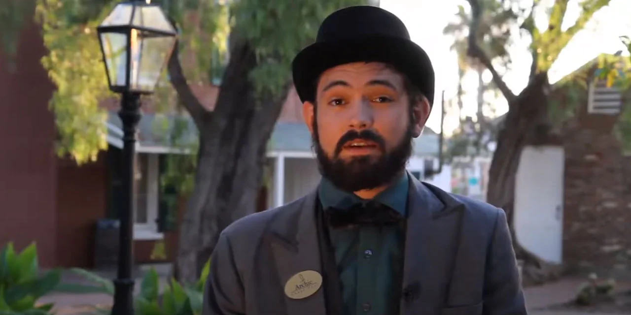 Archie, costumed ghost host